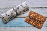 Changing pad, diaper clutch, car seat arm cushion